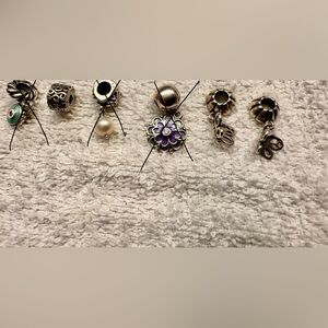 Pandora Bracelet Clips
2 Butterflies
1 Scroll